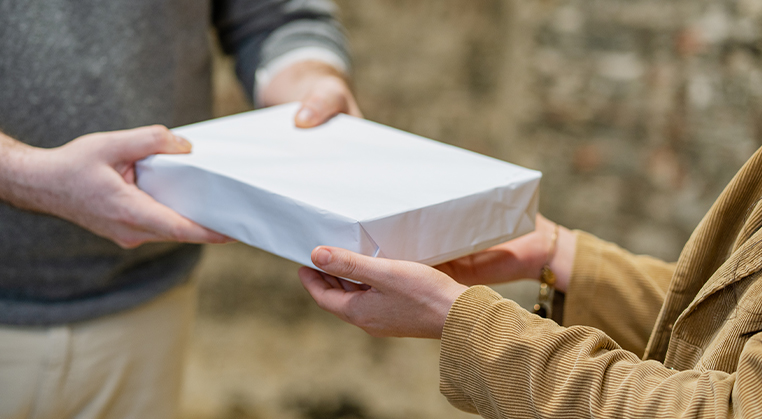 People exchanging a package